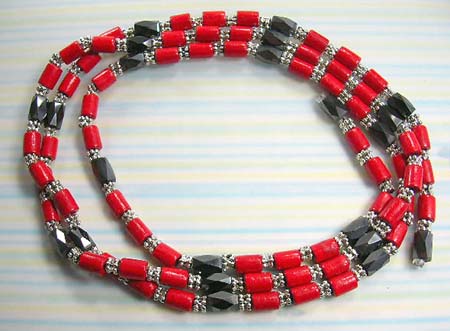 Hematite supporting jewelry magnetic USA supplier distribute hematite necklace in red wooden beads paired with black gemstones 